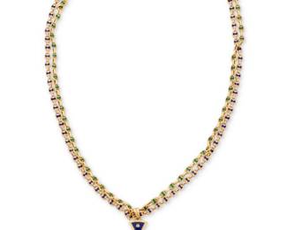 53 An 18K Gold, Enamel, Ruby and Diamond Cross Necklace Featuring a mariner-style double chain accented by green and blue enamel, suspending a blue enamel gold cross pendant set with a single round ruby and single-cut diamonds  Chain: 32 in., Cross: 2 x 1 1/2 in. 147.6 grams gross Estimate: $12,000 - $18,000