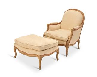 368 A Louis XV style upholstered duchesse brisée 20th century Each piece of the chair and ottoman carved with floral accents, with scrolled armrest terminals and front feet, upholstered in a cotton fabric with cording 2 pieces Chair: 40.75" H x 33.5" W x 36" D; Ottoman: 19" H x 33" W x 26" D Estimate: $300 - $500