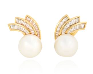 11 A Pair of 18K Gold, Cultured Pearl and Diamond Earclips Centering two cultured pearls measuring 13.5 - 13.77 mm, accented by a spray of tapered baguette diamonds weighing approximately 1.92 carats total 2 pieces  Measures: 1 in. 23.2 grams gross Estimate: $1,500 - $2,000