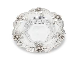 274 An American sterling silver pitcher Early 20th century Marked: STERLING / 1306 / S & E [The Sweetser Co.] Monogrammed 10" H x 9" W x 5" D 20 oz. troy approximately Estimate: $700 - $900