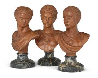 339 Three Italian carved pine wood busts of Caesars Late 19th century Likely depicting Augustus, Tiberius, and Gaius (Caligula), each raised on faux-marble-decorated wood socle 3 pieces Tallest: 13.5" H x 7.375" W x 5.5" D; Shortest: 13.125" H Estimate: $800 - $1,200