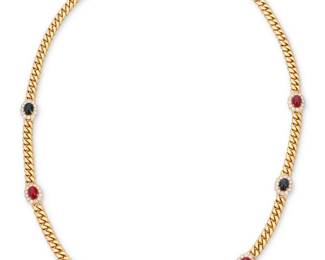 62 An 18K Gold, Gem-Set and Diamond Necklace Of a Cuban link design featuring six stations set with oval sapphire and ruby cabochons all accented by seventy-two round diamonds weighing approximately 7.20 carats, no.29573  Length: 30 3/4 in. 189.6 grams Estimate: $15,000 - $20,000