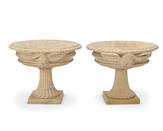 242 A pair of carved hardstone pedestal bird baths Late 20th century Each carved with opposed birds in high relief 2 pieces Each: 19.75" H x 25.75" Dia. Estimate: $1,000 - $1,500