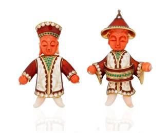21 A Pair of 18K Gold, Coral and Enamel Brooches Including two carved coral figural designs featuring garments of red and white enamel accented by round diamonds and emeralds, with makers mark B 2 pieces  Measures: 2 1/4 x 1 3/4 in., and 3 x 1 3/4 in. 61.5 grams gross Estimate: $4,000 - $6,000