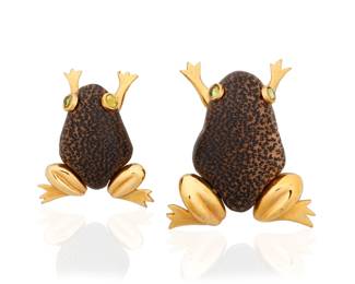 5 L'oree du Bois: Two Gold-Plate and Wood Brooches Of a frog design featuring carved wooden bodies, gold-plated legs and finished with green glass eyes, signed L'oree du Bois, France  Measures: 2 1/4 x 1 3/4 in. and 1 3/4 x 1 1/2 in. 53.9 grams gross Estimate: $1,000 - $1,500