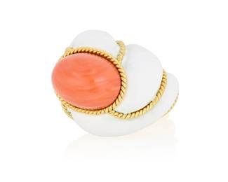 15 An 18K Gold, Coral and Enamel Ring Of a domed design centering an oval coral cabochon set in twisting sections of white enamel and gold rope accents  Size: 6 1/2 37.1 grams Estimate: $3,000 - $5,000