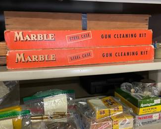 . . .  gun cleaning kit and firearm supplies