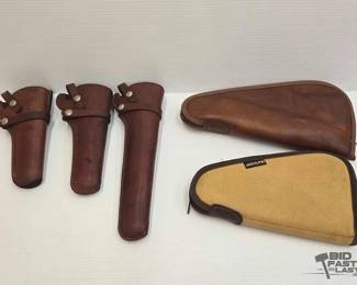 1348  2 Soft Pistol Cases  3 Holsters 