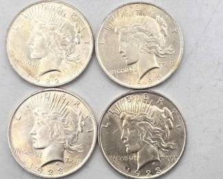 76  4 Silver Peace Dollars 