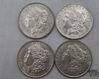 54  4 Morgan Silver Dollars 
