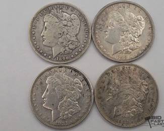 73  4 Morgan Silver Dollars 