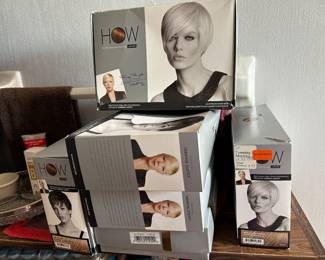 Wigs unused in boxes