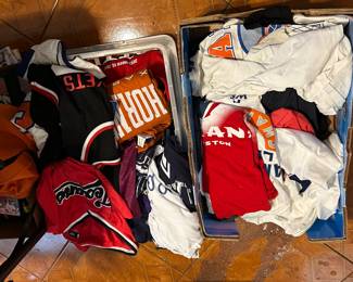 Many athletic tee shirts 