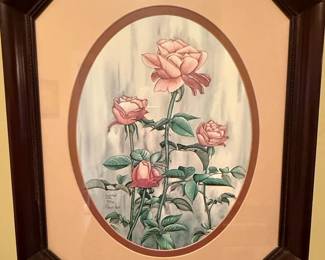 This is a limited edition print titled "Summer Roses" by artist Carmel Foret, dated 1986. The artwork features a delicate watercolor-style depiction of several pink roses in various stages of bloom, with lush green foliage. The print is signed by the artist and numbered 481 out of an edition of 1800. It is presented in an octagonal wooden frame with a complementary oval matting. The style is reminiscent of traditional floral watercolors, evoking a sense of natural beauty and tranquility.