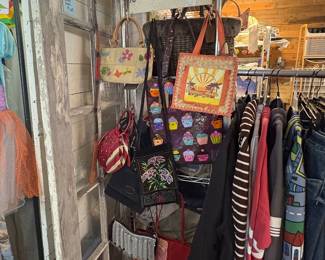 Variety of ladies, purses, and bags, glass front door