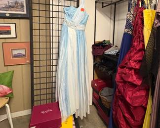 Metal clothing rack on wheels prom dresses, designer shoeboxes