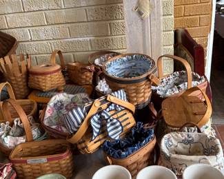 Longaberger pots, shelves and many many baskets. 