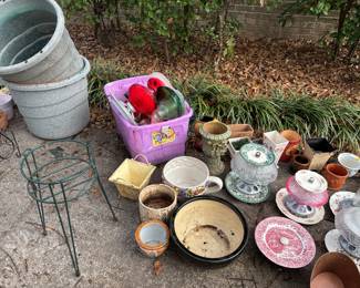 Lots of handmade bird feeders 