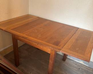 Wood table with 2 ends fold into middle 