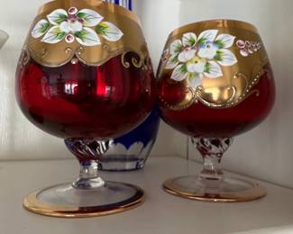 Pair of Bohemian Cranberry Red Brandy Snifters with Gilt Enamel Floral Decoration