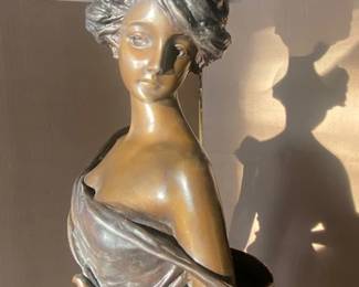 Detail of figure and patinated surface.