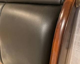 Collezione Europa king sleigh bed with upholstered leather headboard.