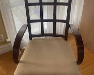 Arm chair variation within 10-chair set.