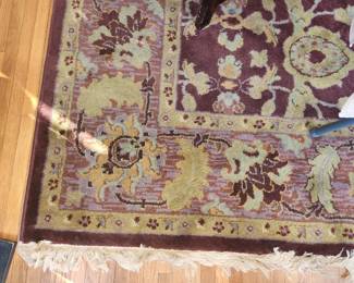 Multiple sizes and patterns of burgundy Oriental Weavers area rugs