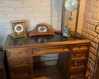 Desk and great collection of clocks