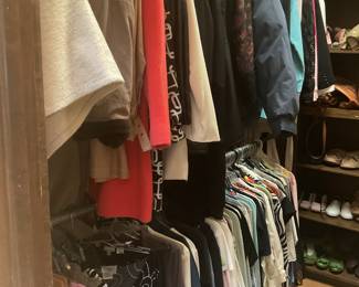 Walk in closet with women’s clothing 
