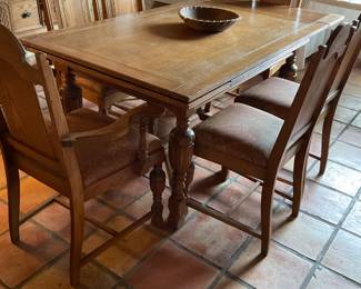 light wood table- has to fold down leaves at the end of the table