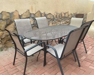 Oval patio table with 6 chairs