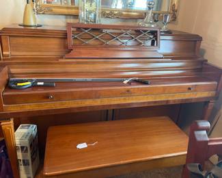 Wurlitzer piano with bench