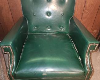 MCM dark green vinyl chair with nailhead trim