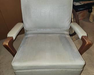 MCM vinyl and wood swivel chair