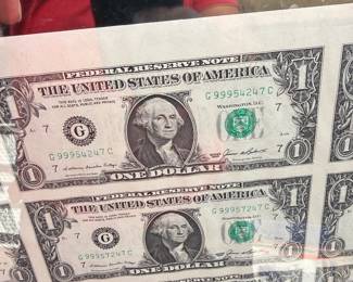 Uncut dollar bills