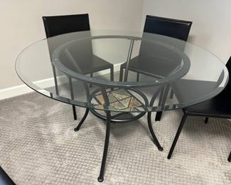 Glass table with (4) chairs (chairs shown in next photographs) - $200