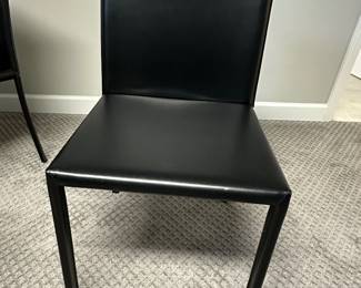 (6) Calligaris leather side chairs with leather wrapped legs - $125 each