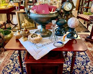 VIGNETTES THROUGHOUT OF ANTIQUE FINE FURNITURE, SHELLS, DECOR, ANTIQUARIAN BOOKS.