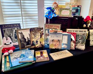 ANOTHER TABLE FULL OF CHILDREN'S BOOKS MOSTLY SIGNED.