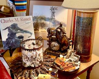ANTIQUE SIDE TABLE WITH GARGOYLE BRASS PULL LOADED FULL.