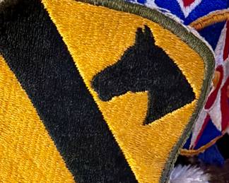 BAG FULL OF WWII PATCHES.