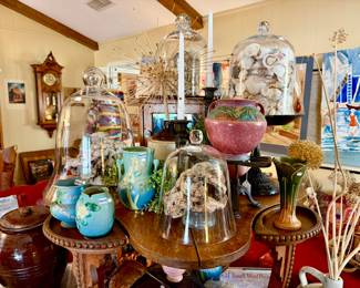ROSEVILLE, VAN BRIGGLE, WELLER POTTERY WITH CLOCHES FULL OF SHELLS AND ROCKS ON THIS AMAZING POKER TABLE.