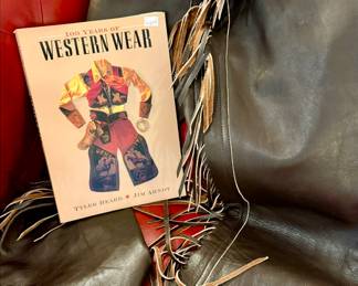 VINTAGE LEATHER FRINGED CHAPS.