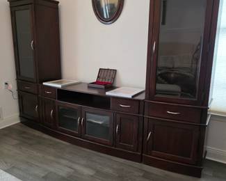 Like new with glass shelves and lights up.. even a top piece that connects both sides together 