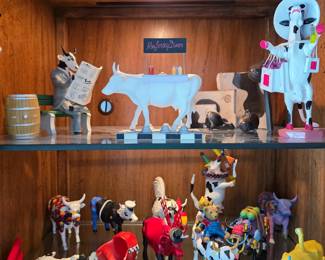 Entire collection of glass blown and carved or sculpted cows