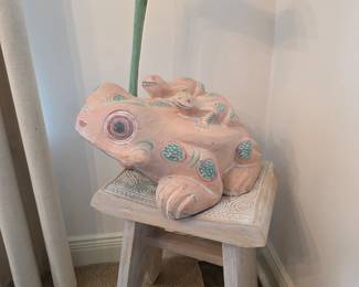 Frog sculpture and bench