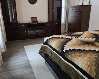 Cherry colored wood wall unit 