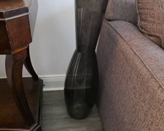 1 of 2 matching tall black vases