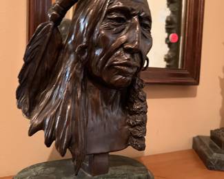 The plaque reads: "Indian Bust, C. M. Russell".